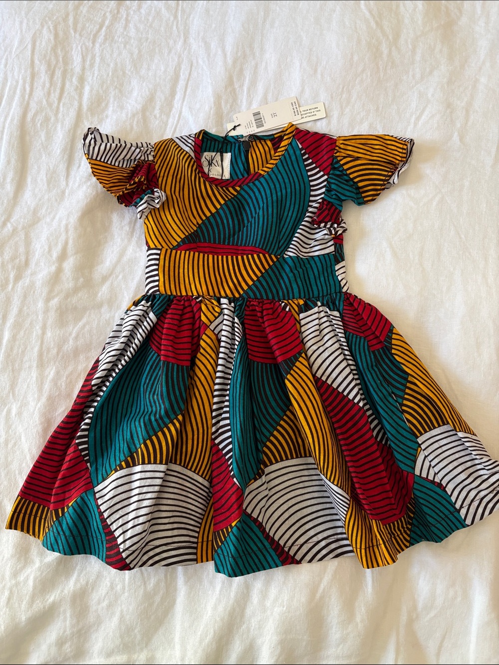 Sika Girls' Colorblock Swirl Print Dress in Teal, Mustard & Red